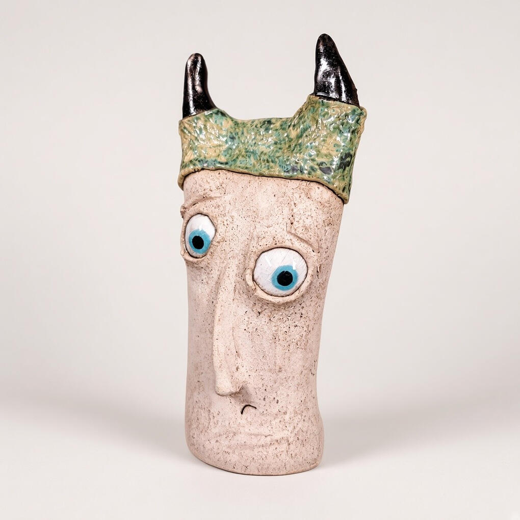 Horned Creature Sculpture